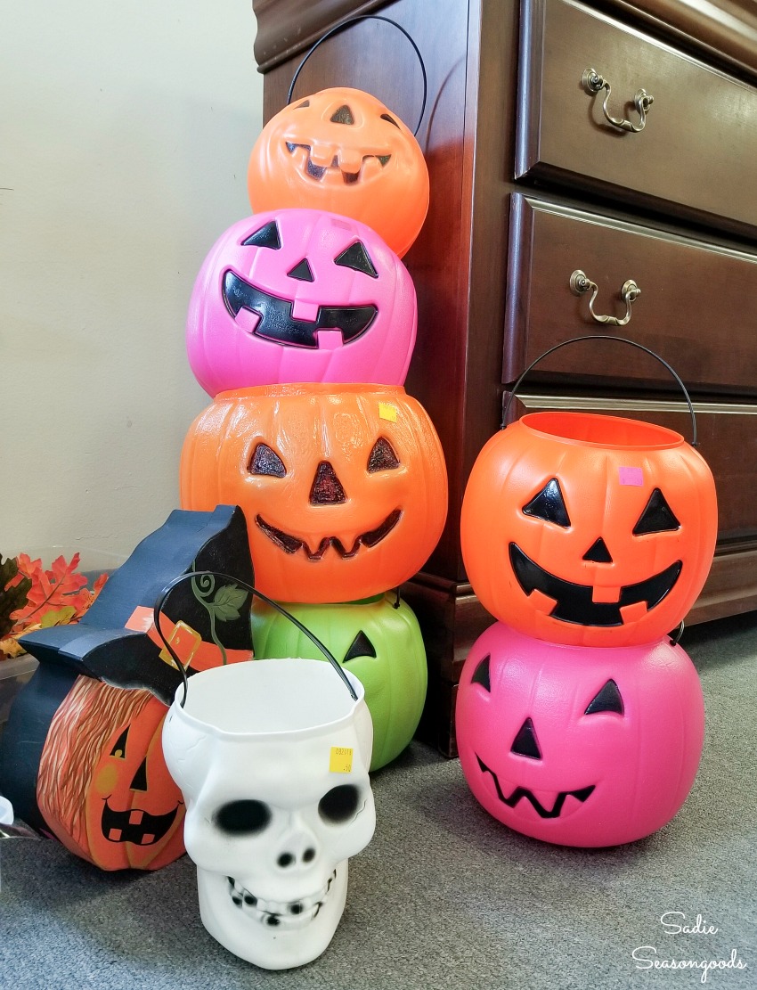 Plastic pumpkins at a thrift store