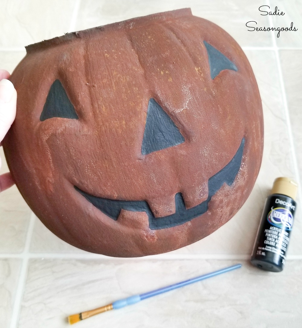 Rust effect paint on a Halloween candy bucket