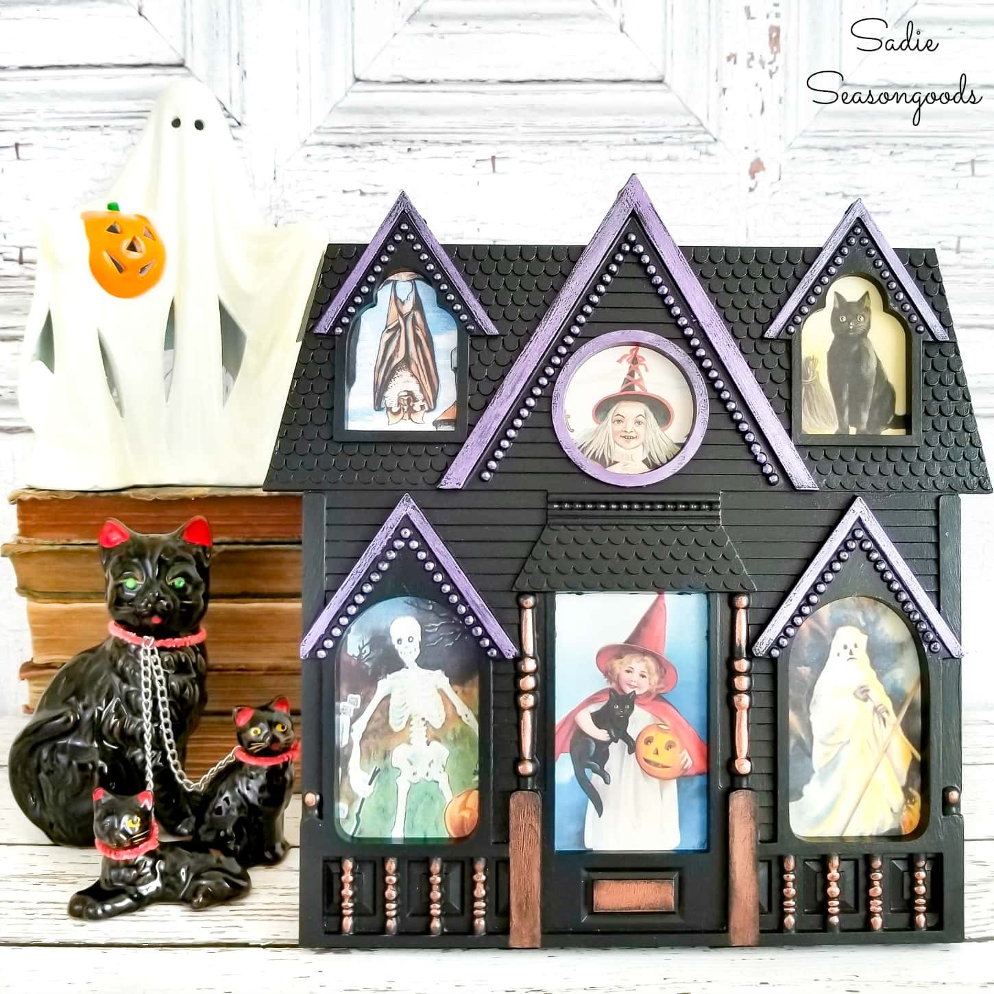 Haunted house decor with a house shaped picture frame