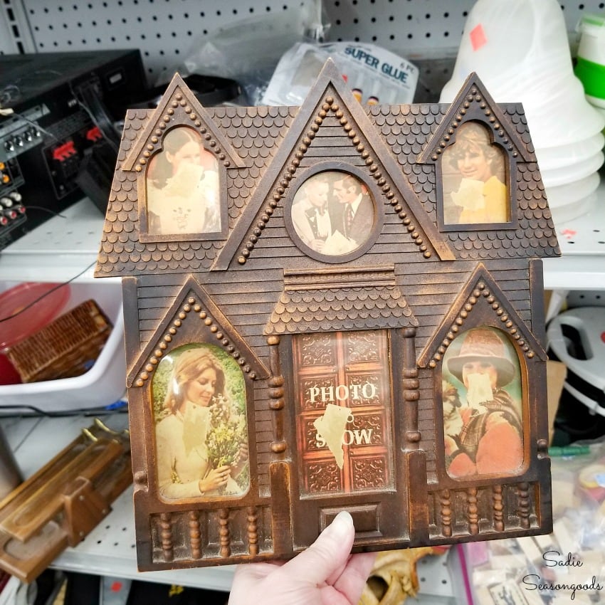 House shaped picture frame at a thrift store