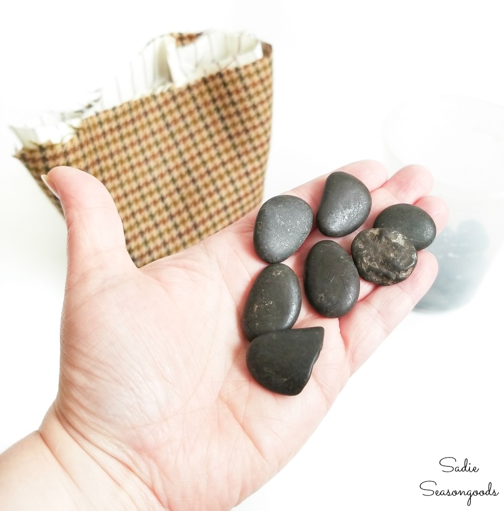 Rocks for weight and stability in the acorn decor