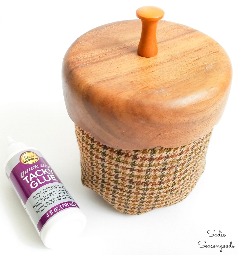 Wooden salad bowl and knob as an acorn cap