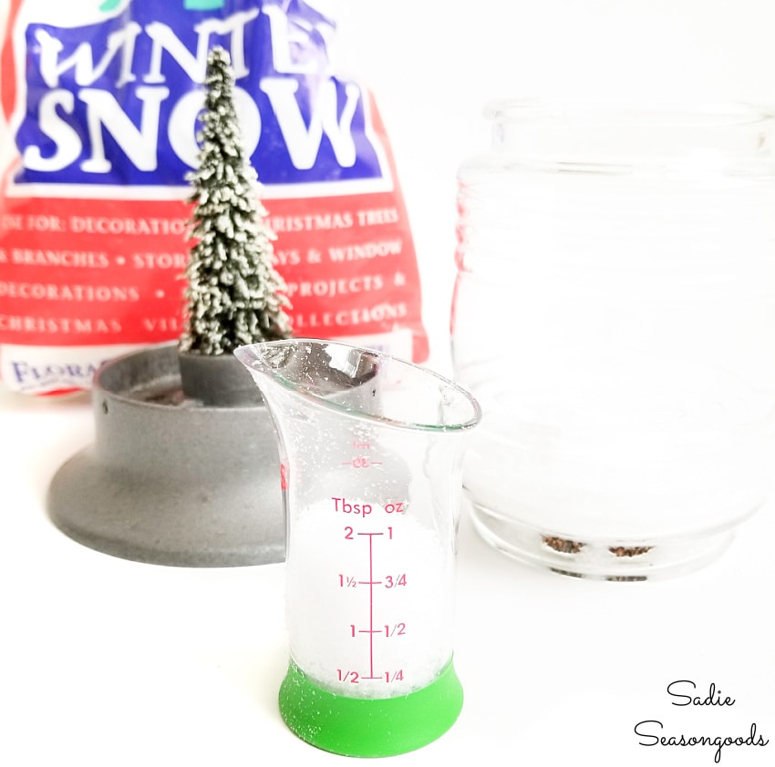 Adding artificial snow to winter snow globes