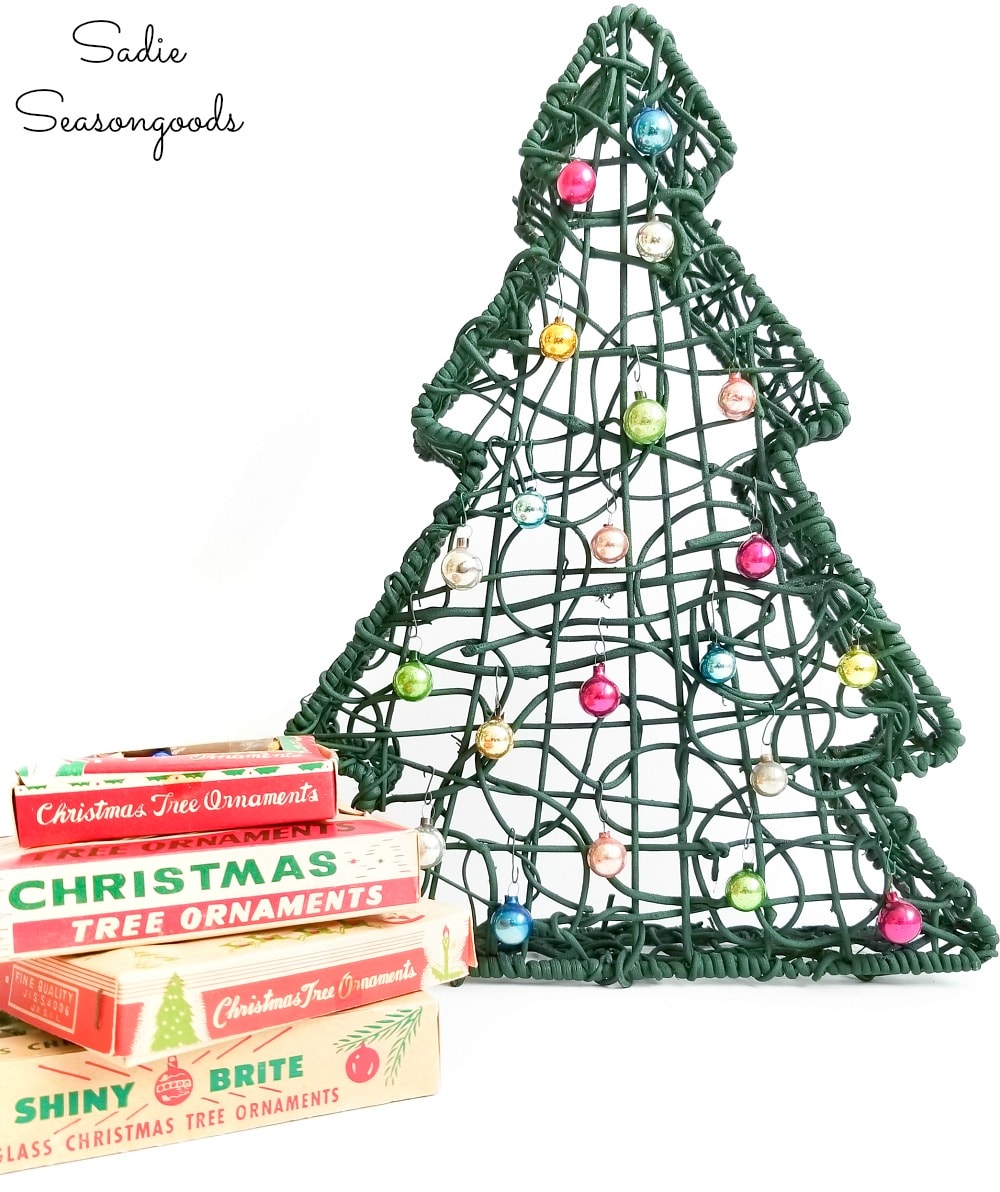 Vintage Shiny Brite ornaments on Christmas tree baskets Vintage Shiny Brite ornaments on Christmas tree baskets