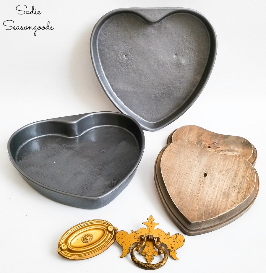 Assembling the heart decorations with cake pans and vintage drawer handles