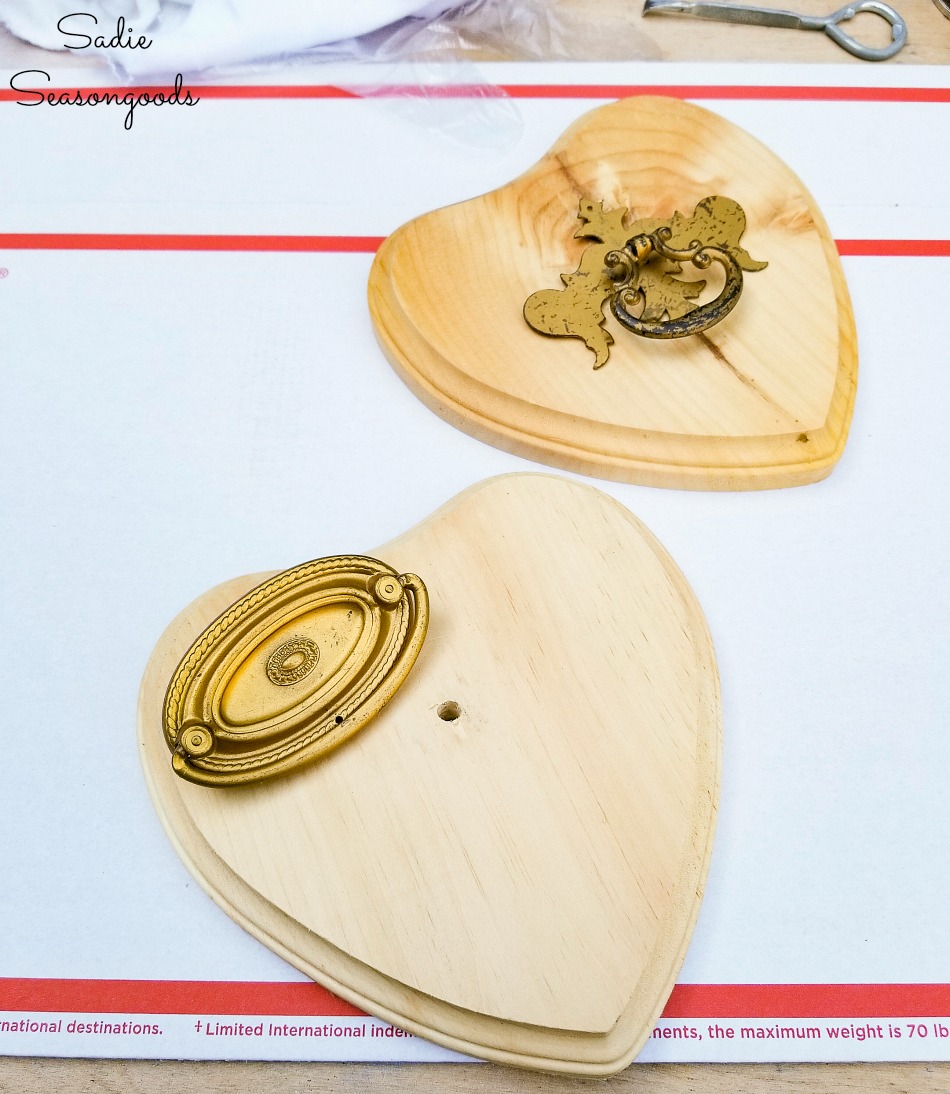 DIY valentine decorations with vintage drawer pulls and wooden hearts