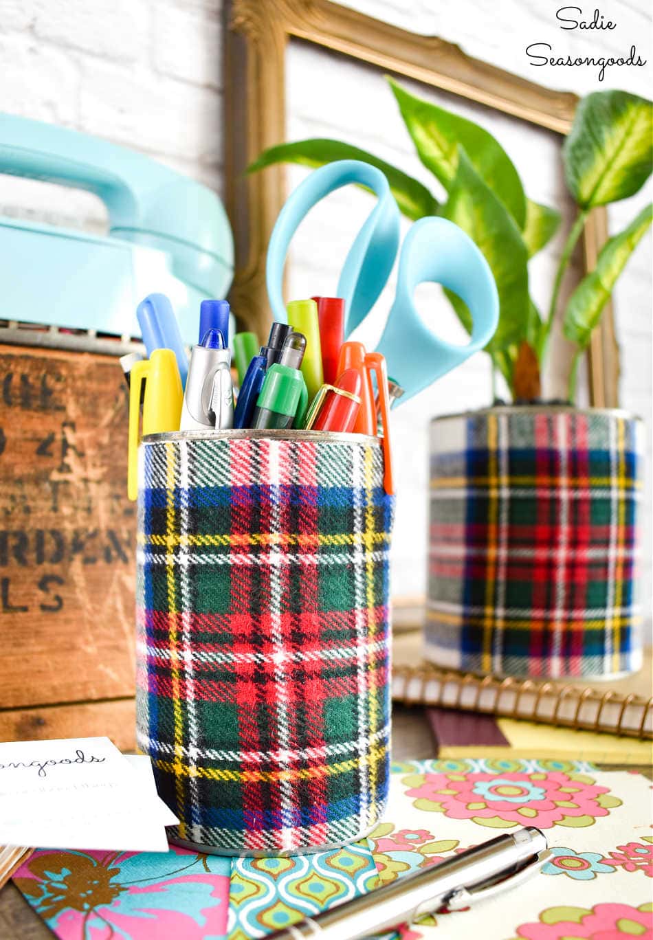 markers and pens in a tin can