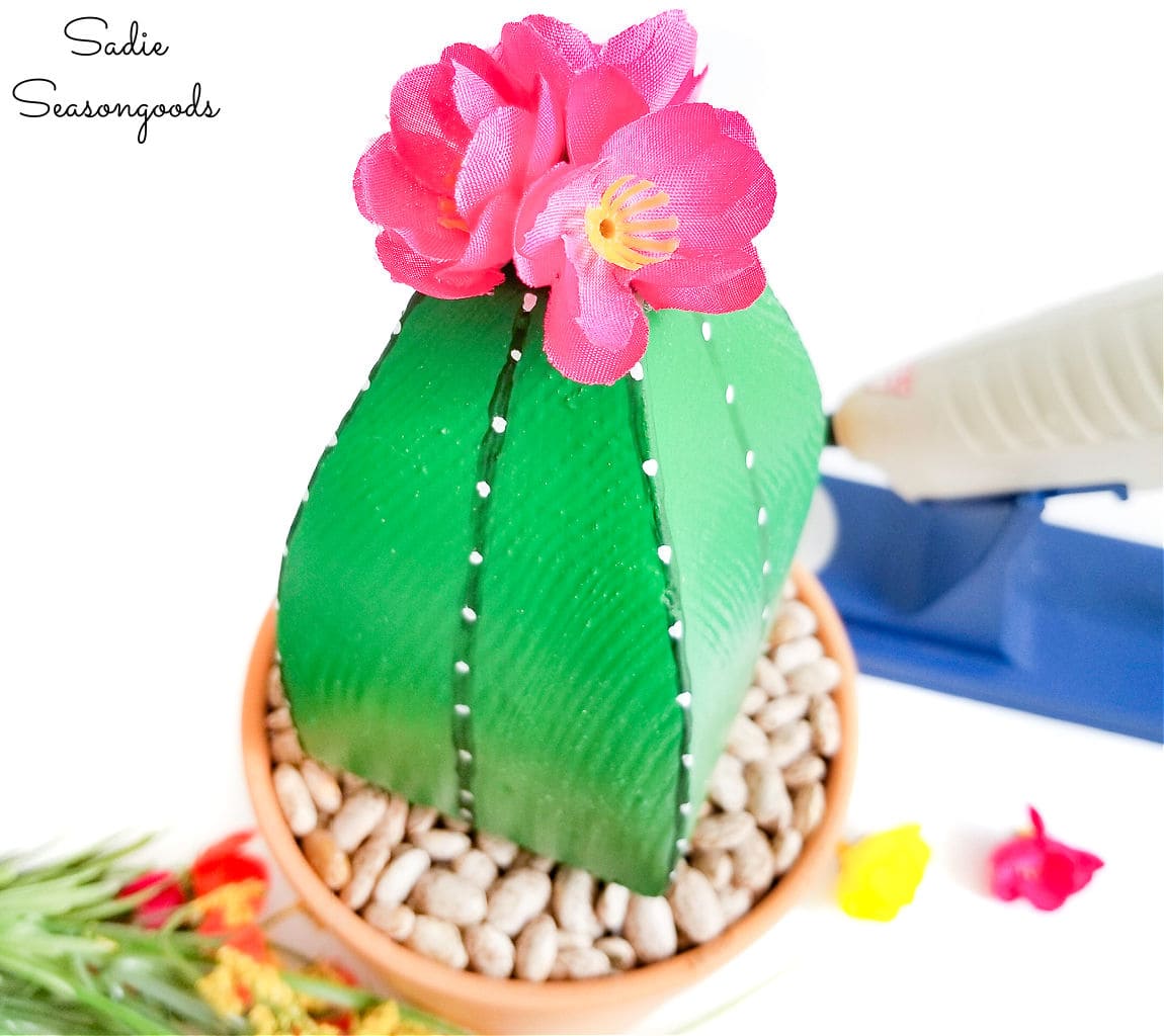 Adding flowers to DIY cactus decor