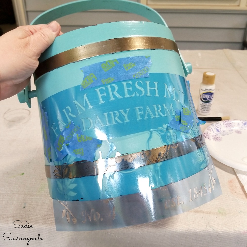 Farmhouse stencil on vintage ice bucket to become a flower bucket