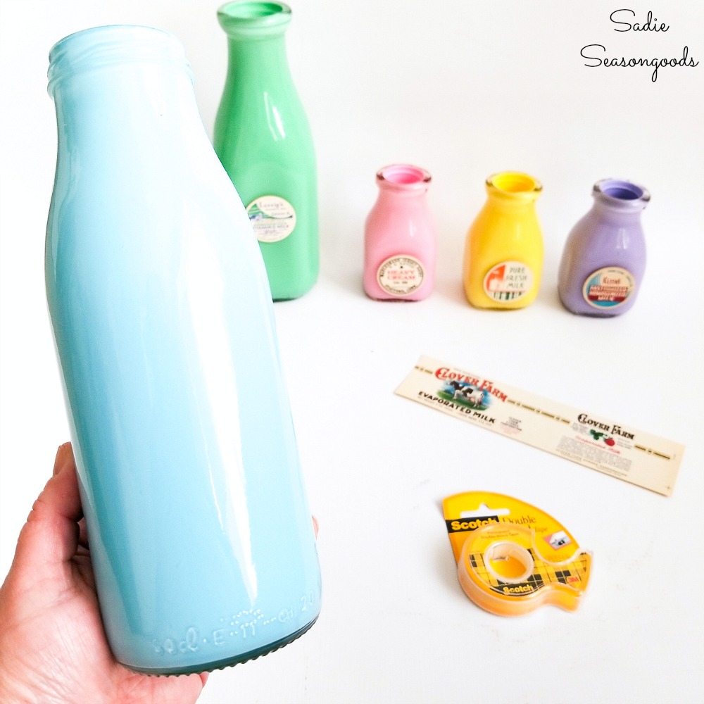 Milk bottle vase for flower decoration at home with old glass milk bottles