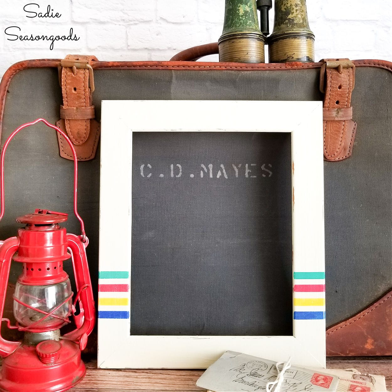 camping decor with repurposed picture frames