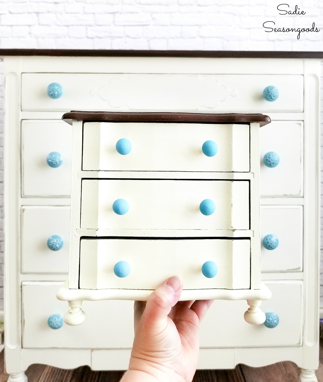 Painted bedroom furniture and a wooden music box that matches