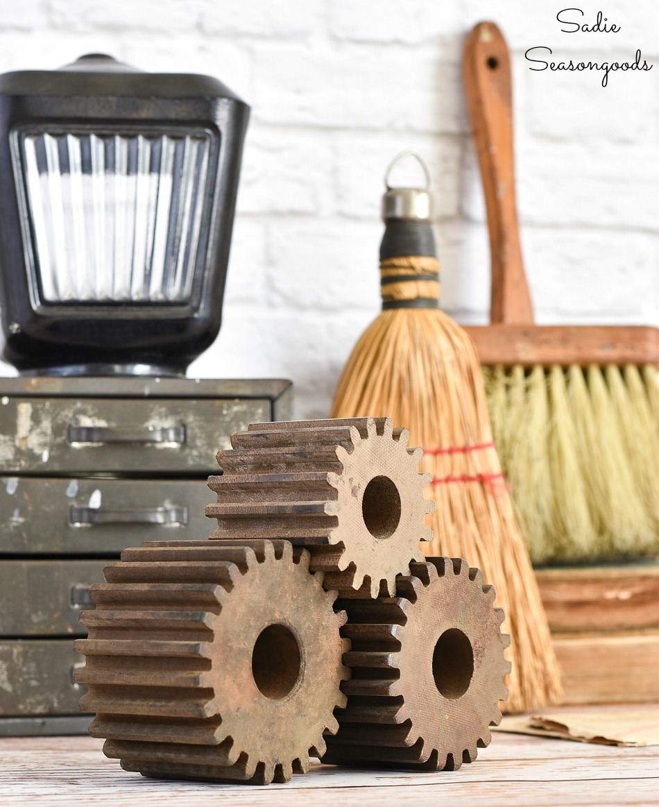 Vintage vignette of industrial decor with factory molds and old brushes