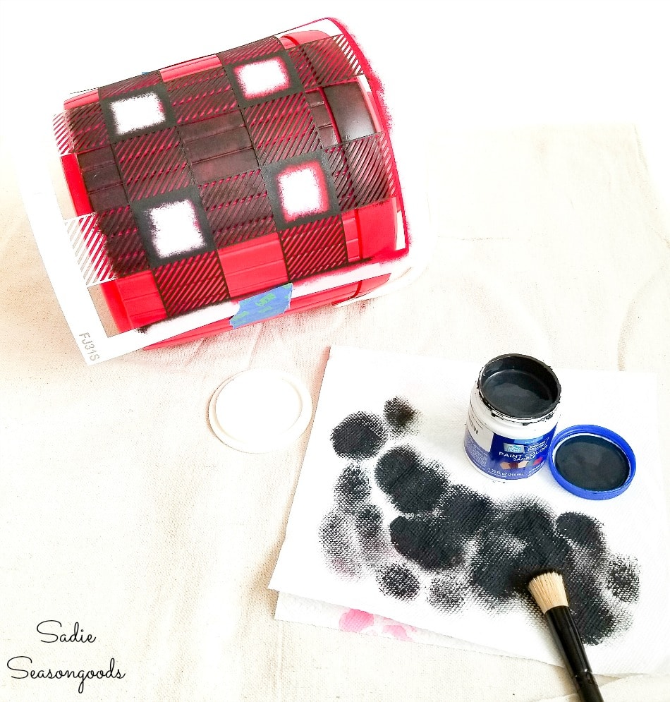 Buffalo plaid Christmas decor on a red cooler