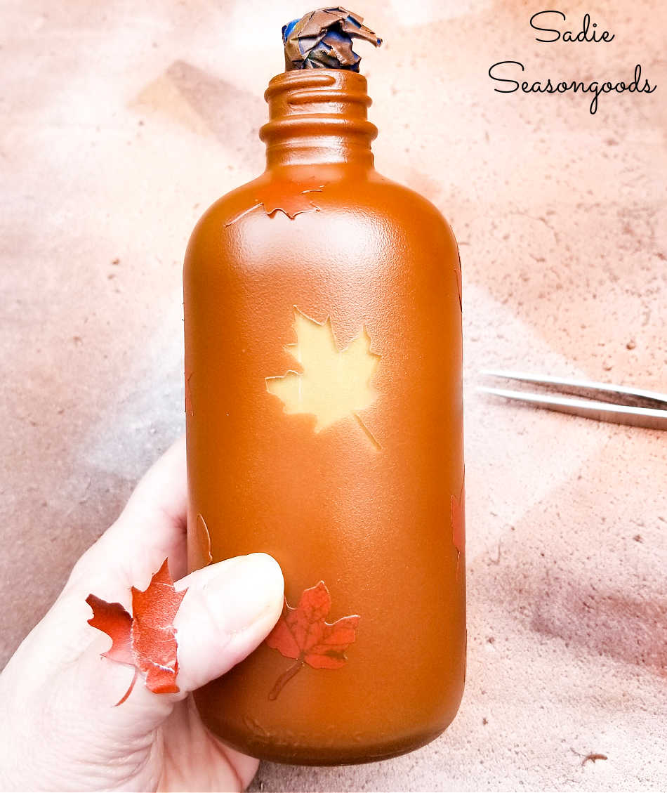 removing the stickers from the amber glass bottles