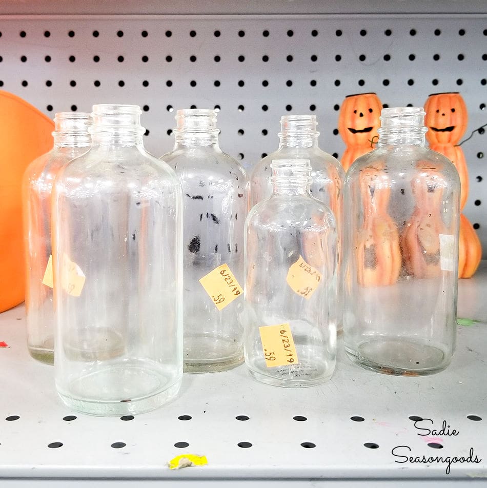 small glass bottles at Goodwill