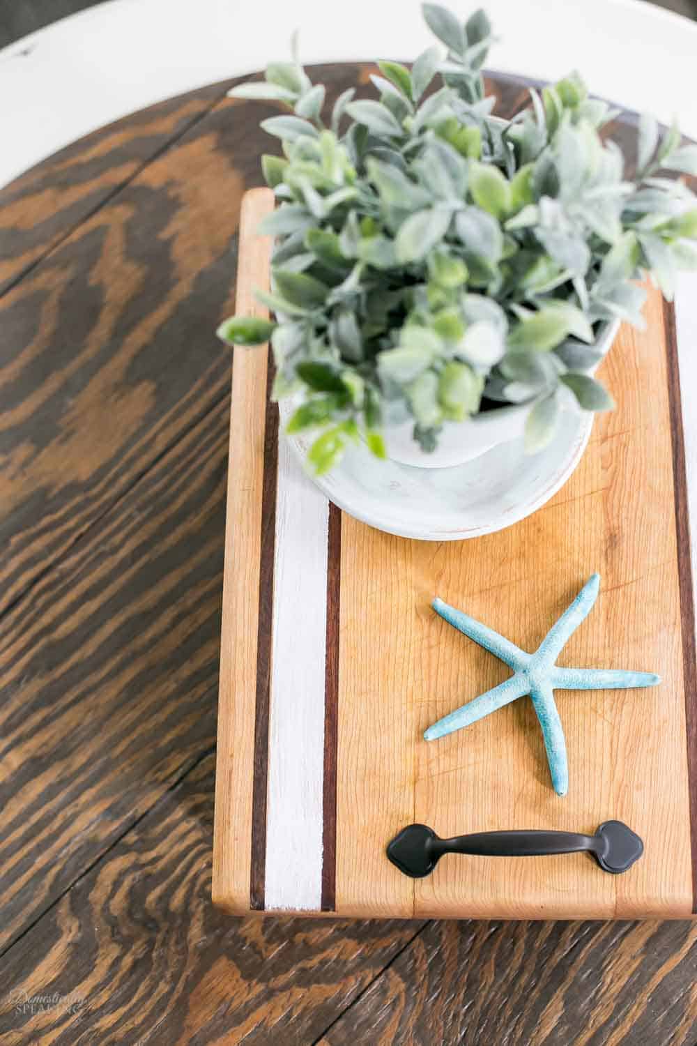 Painting a cutting board from the thrift store and upcycling it into a tray