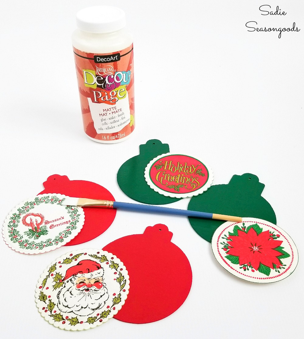 Decoupage glue to attach the paper coasters to the wood ornaments or wood cutouts