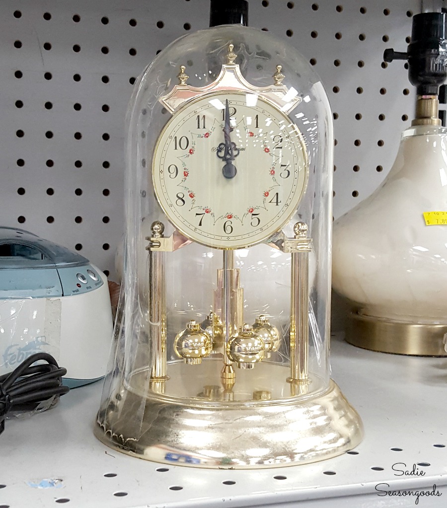 Anniversary clock at the thrift store for upcycling into a cloche for a winter cabin