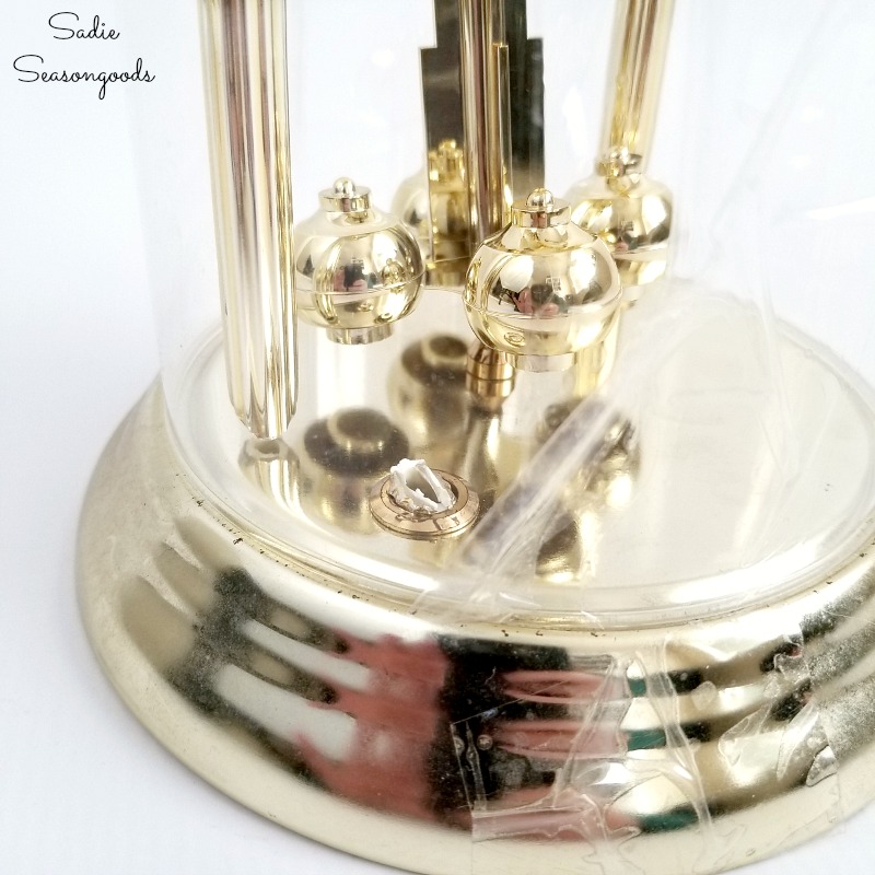 Upcycling an anniversary clock or dome clock into a cloche for log cabin decor