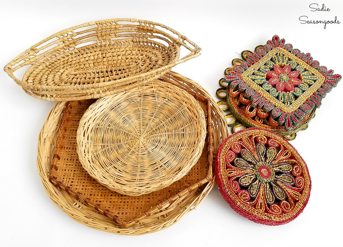 Upcycling some baskets from the thrift store into a Boho gallery wall with woven trivets