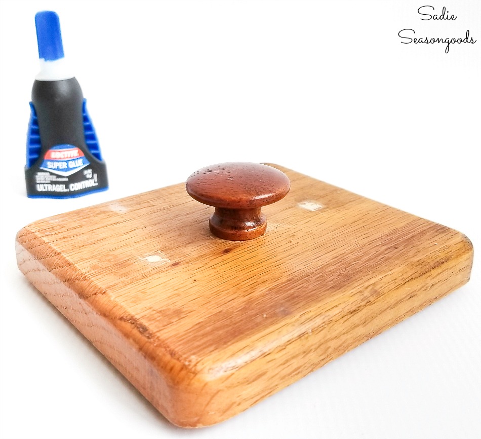 Attaching a wooden knob to the top of the retro canisters