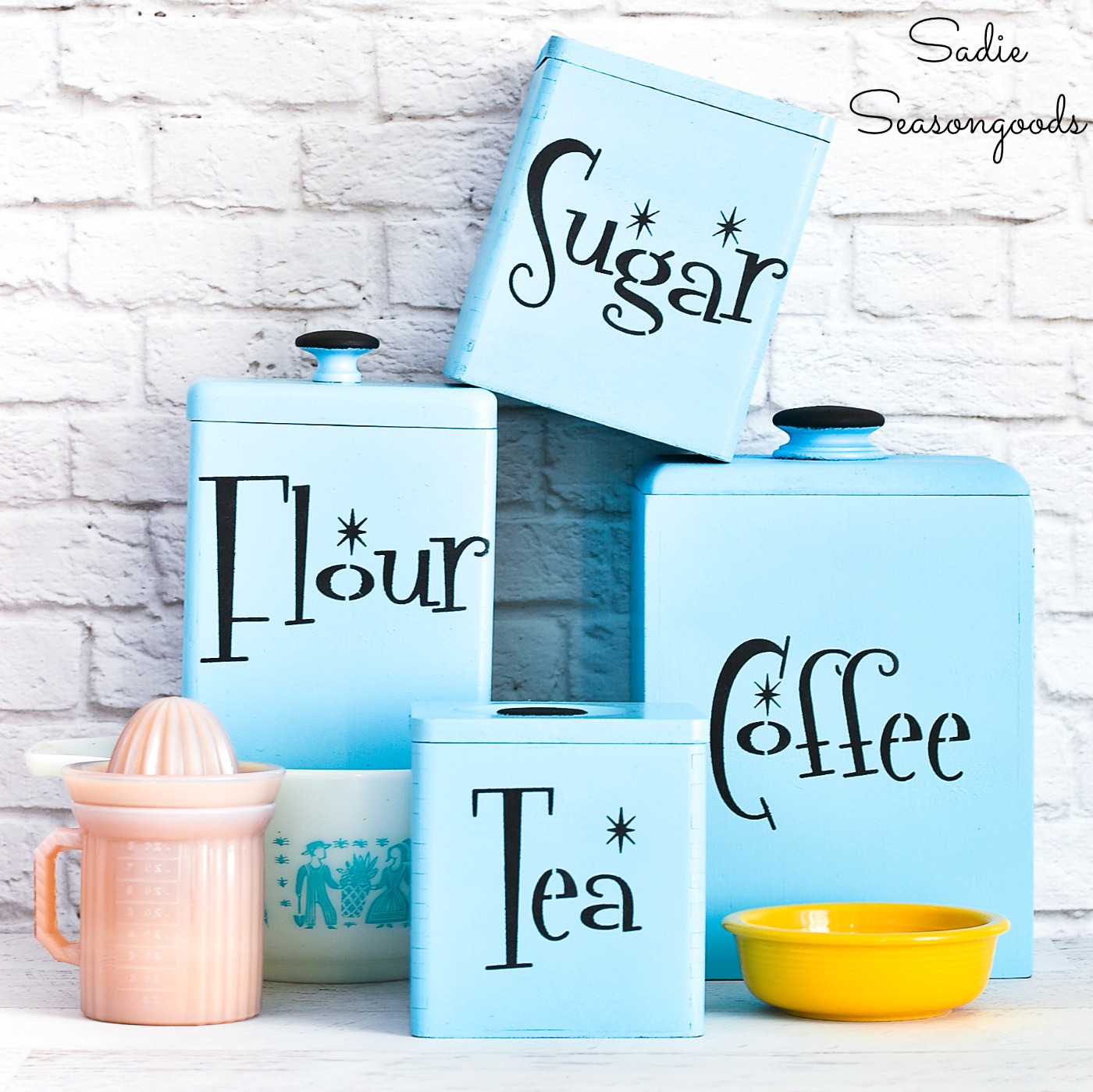 Retro canisters with a mid century modern font for aqua kitchen decor