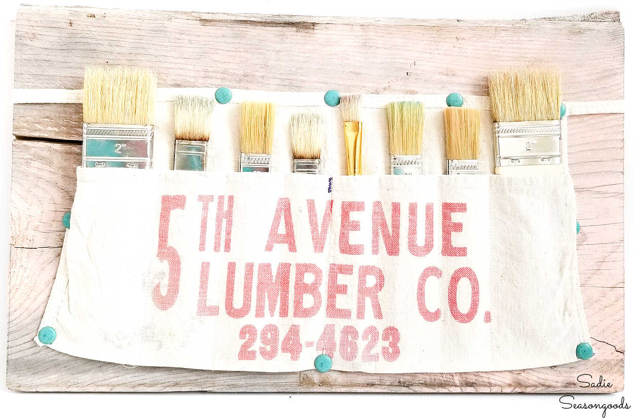 paint brush storage in a canvas apron