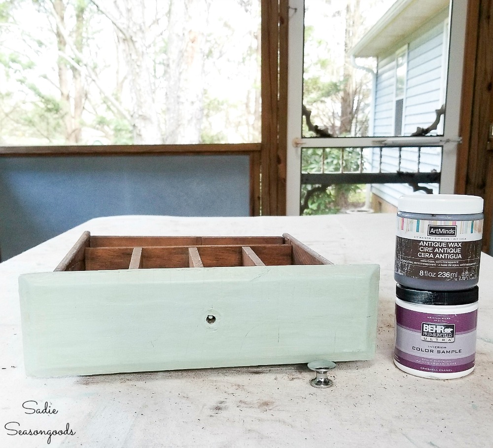 Antiquing wax and sage green paint on a cutlery drawer