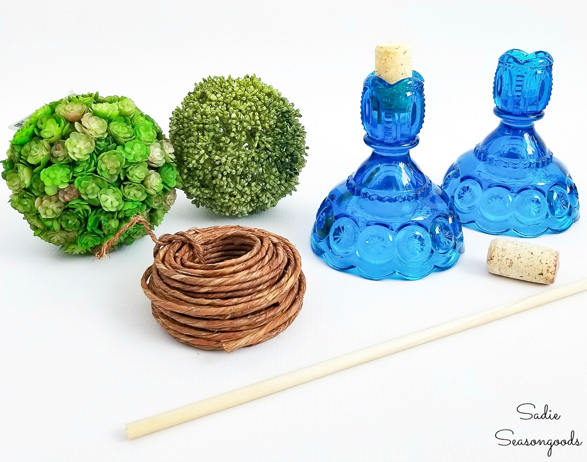 Craft supplies and vintage candlesticks to make the Spring topiaries