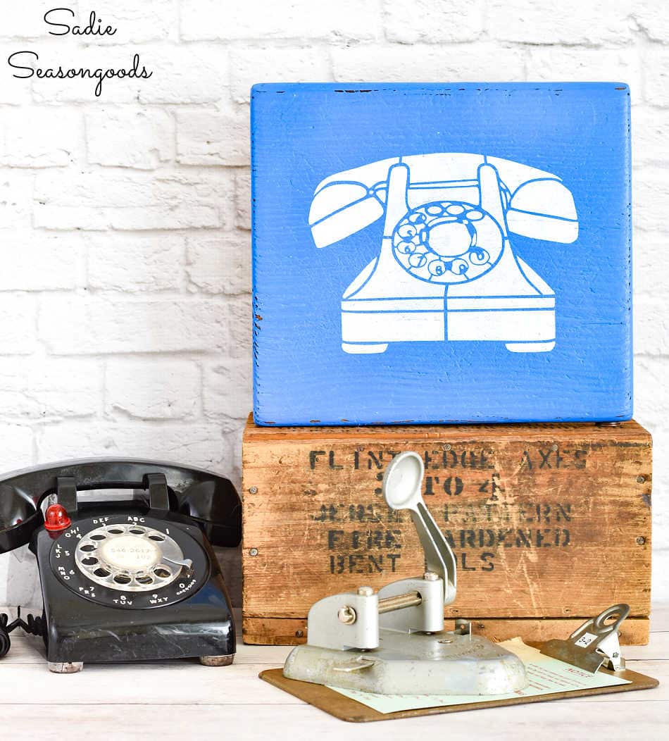 telephone sign on a small cutting board
