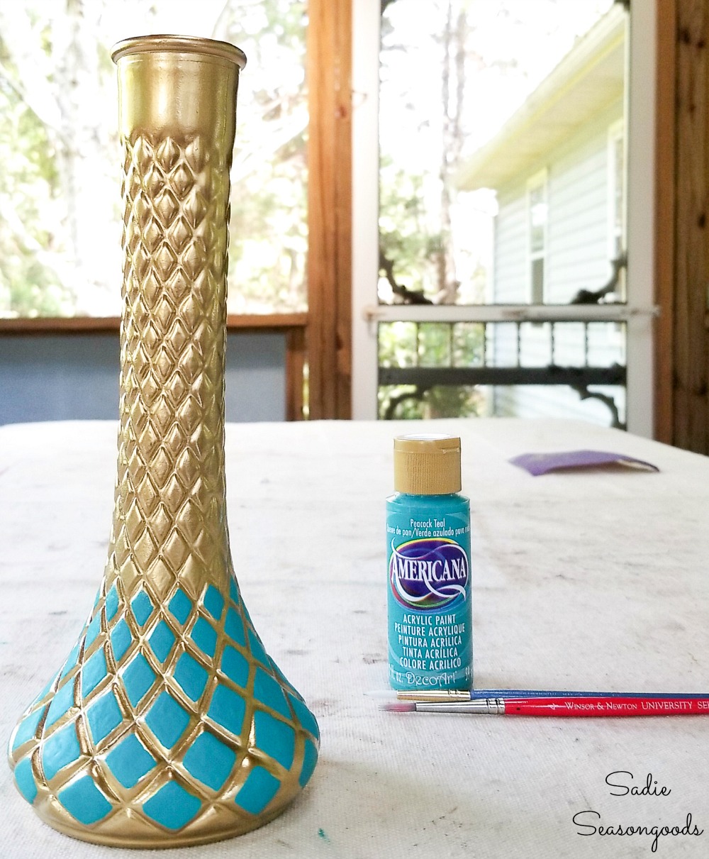 Florist vases that have been painted like a Cloisonne vase