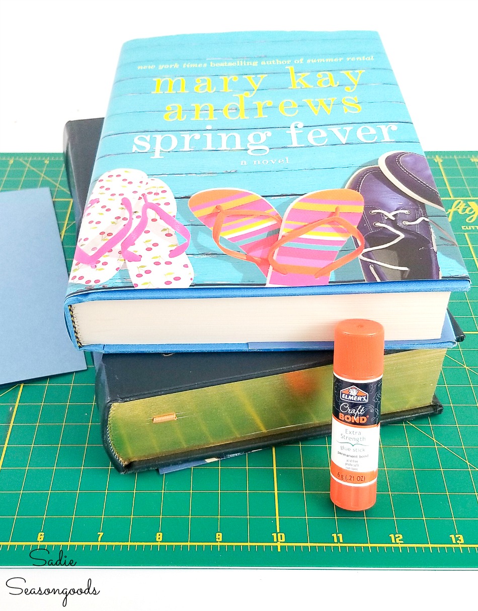 Glue stick to attach the mulberry paper to the file folders in cardmaking