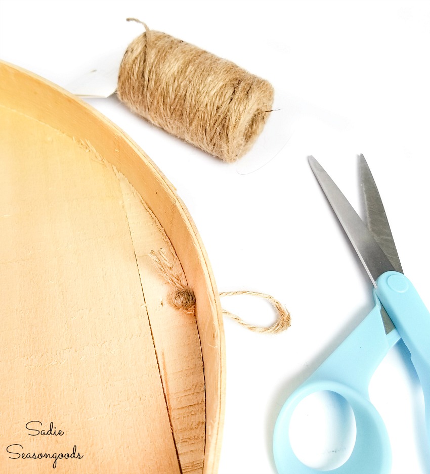 Adding a wreath hanger to the lid of a wooden cheese box