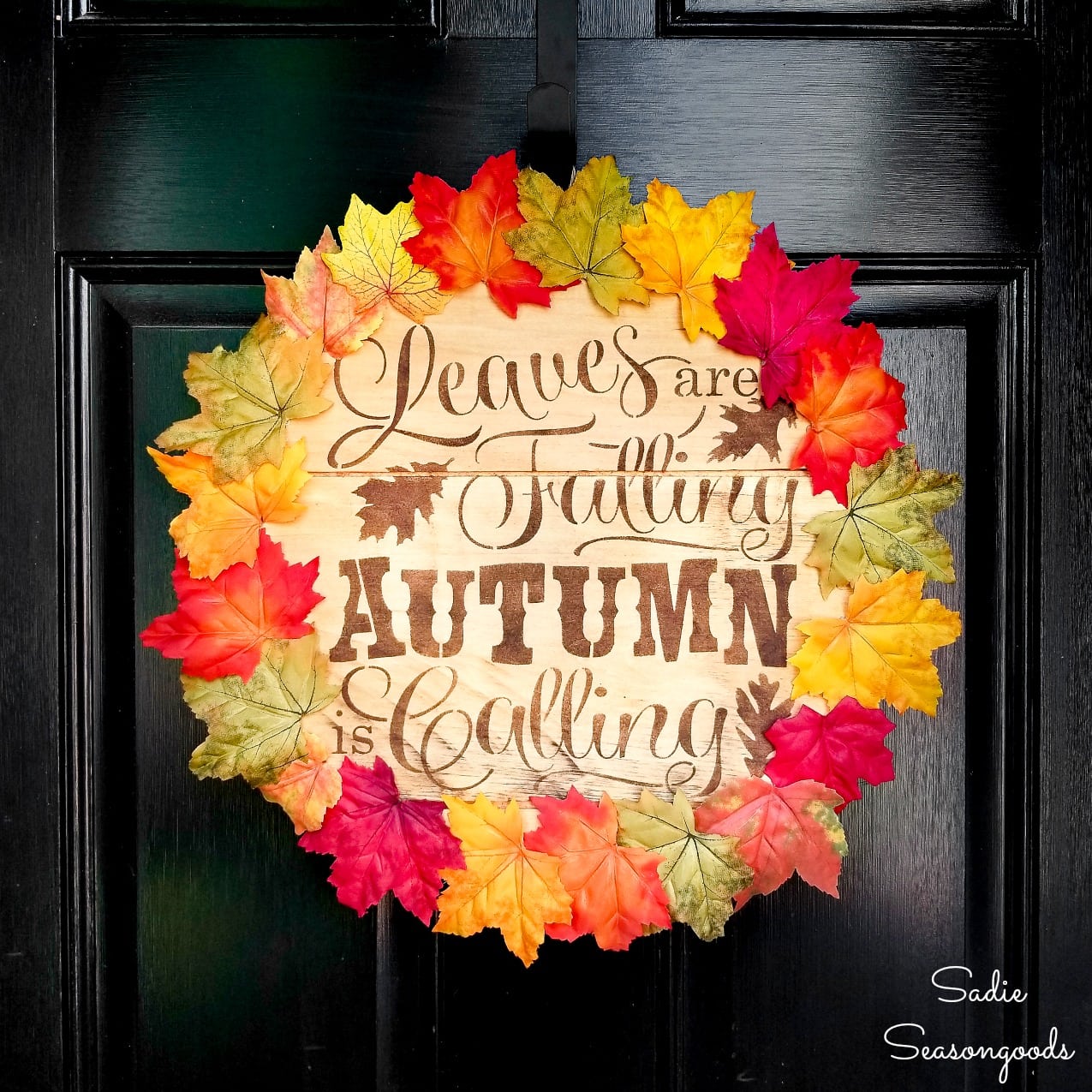 fall door wreath with the lid of a wood cheese box