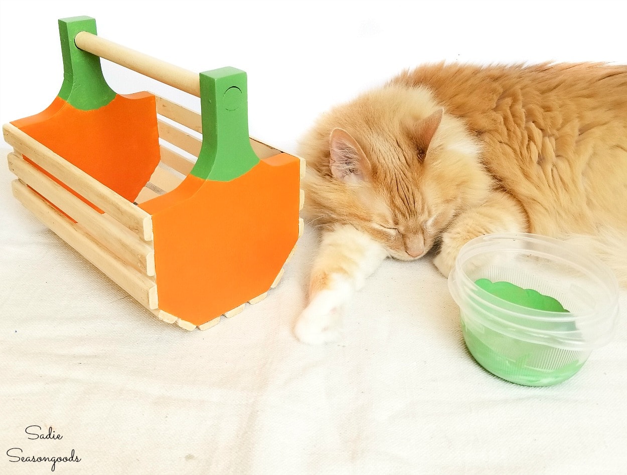 finishing a makeover on a small wooden basket