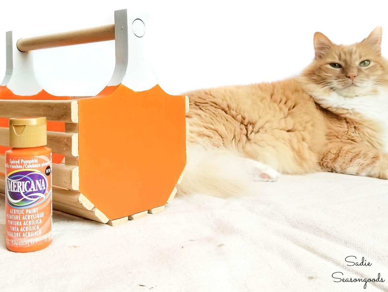 painting a pumpkin basket