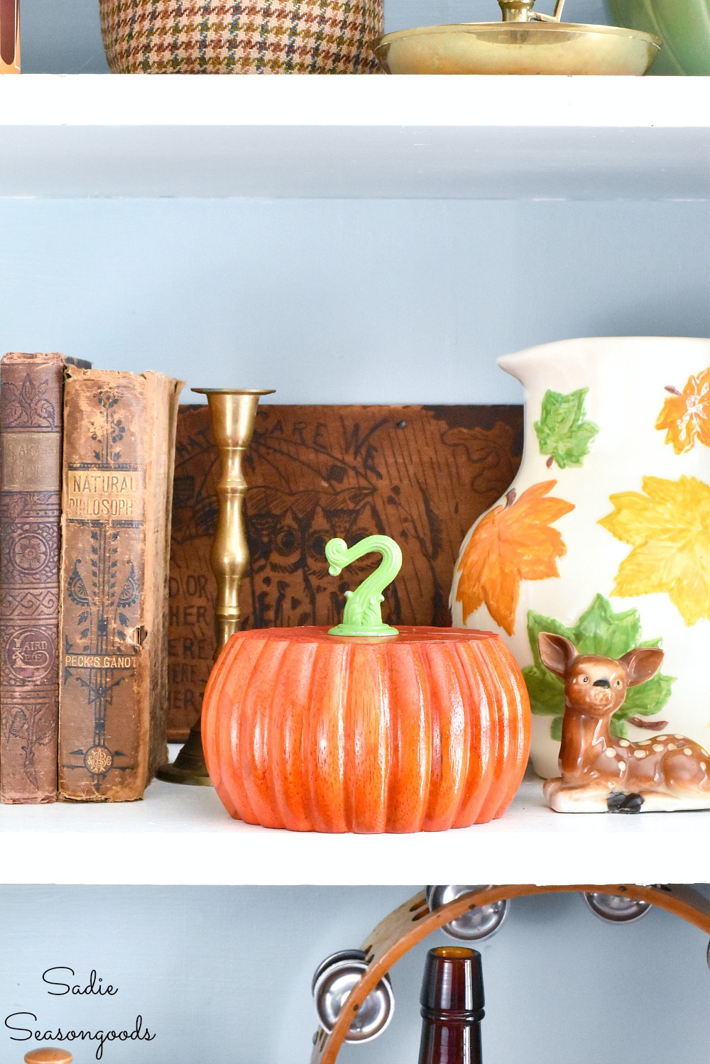 Decorating for autumn with bun feet as wood pumpkins