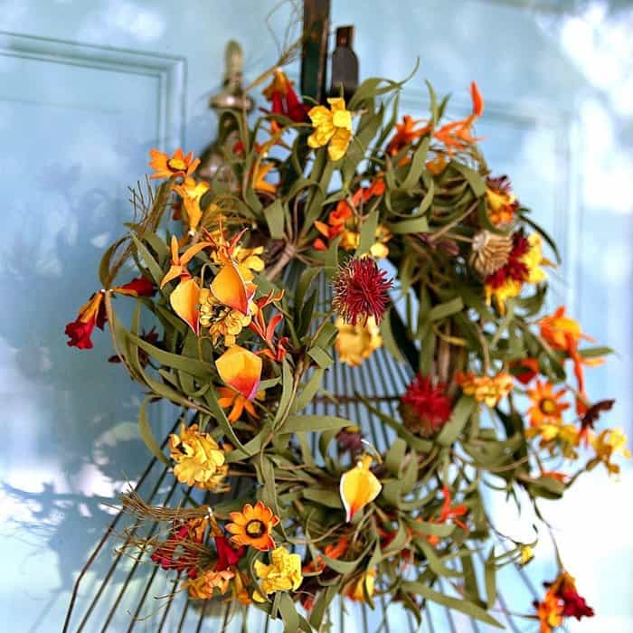 Fall door wreath with a rake head