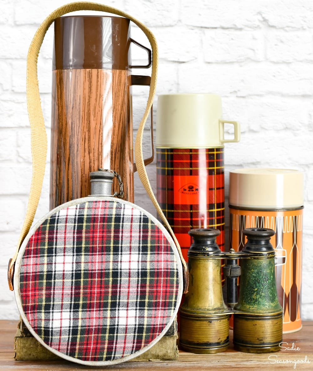 Mountain cabin decor with a metal canteen and flannel crafts