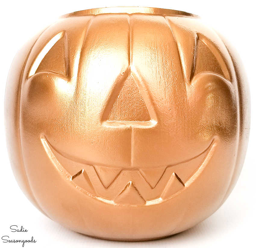 upcycling a plastic pumpkin bucket into chic halloween decor