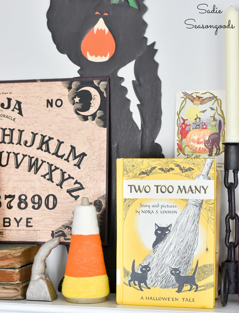 Halloween door hangers as mantel decor