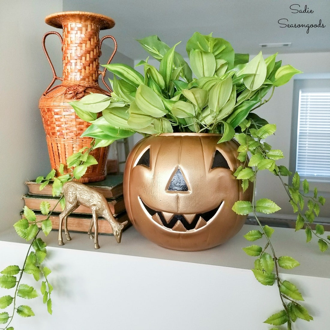 Upcycling a pumpkin candy bucket into modern Halloween decor