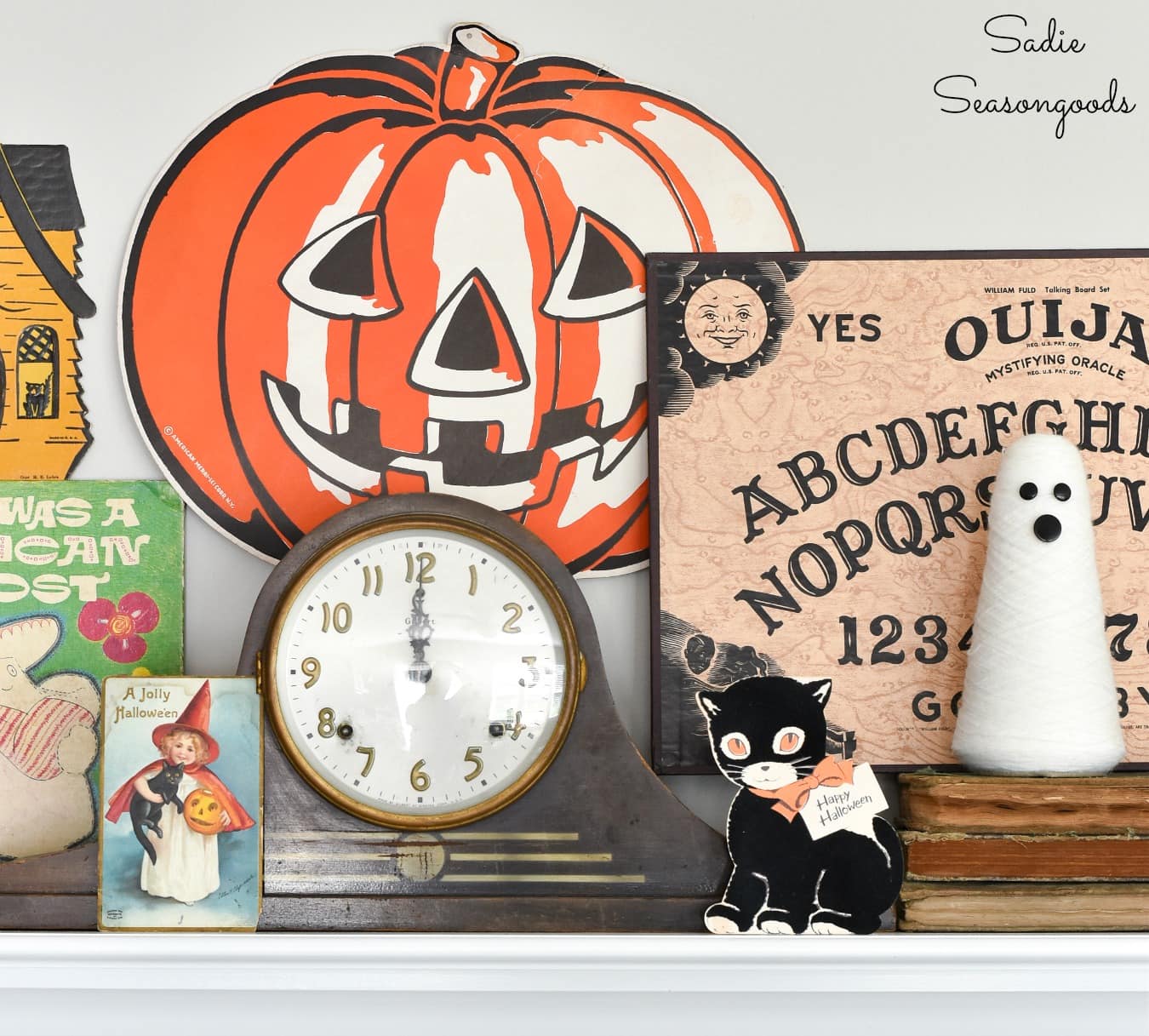 Vintage Ouija board as Halloween mantel decor