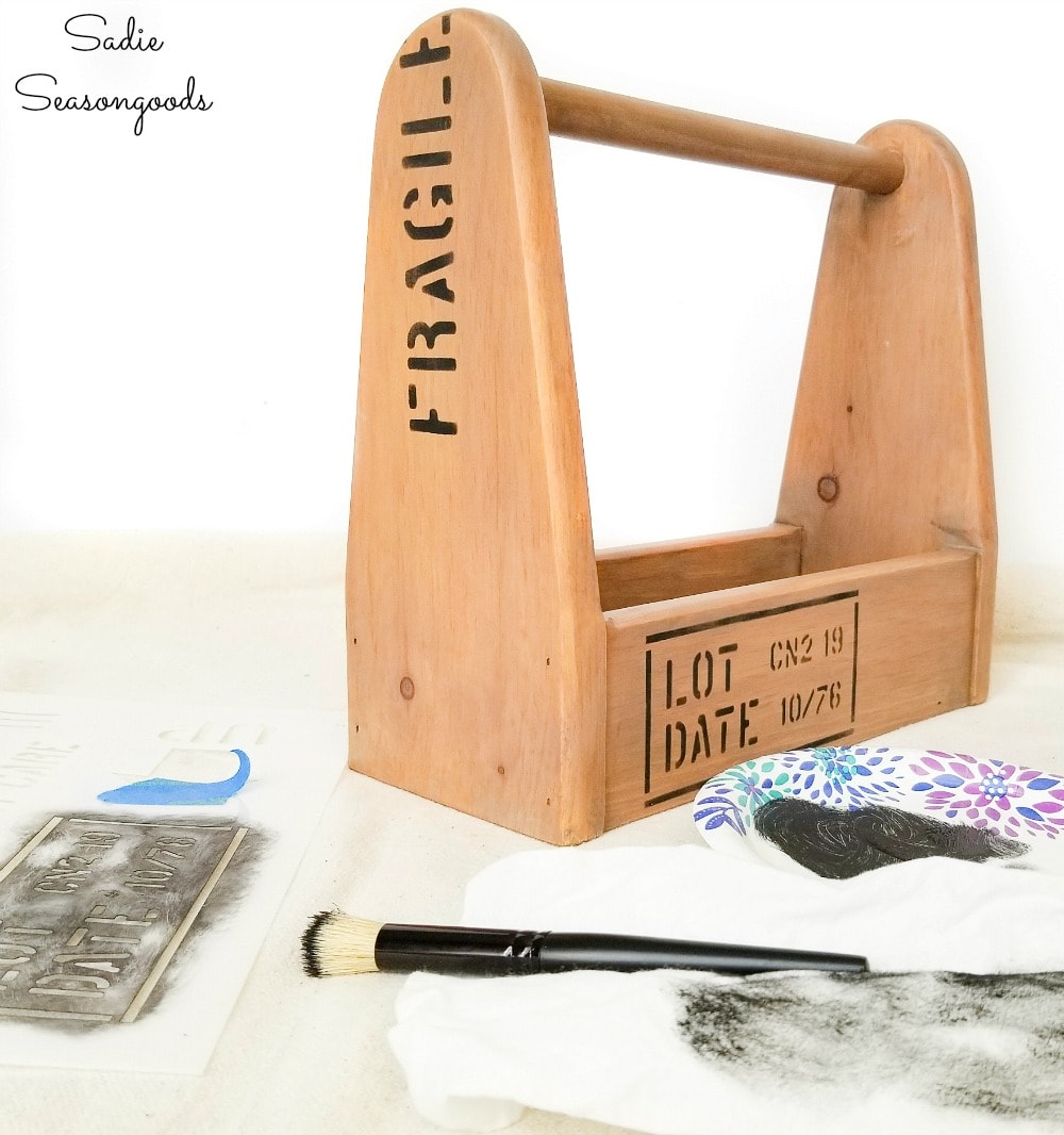 Crate stencils on a wooden tool caddy