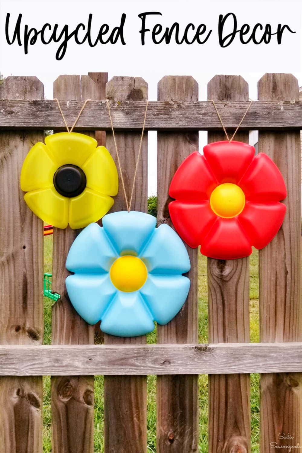 whimsical garden decor for the fence