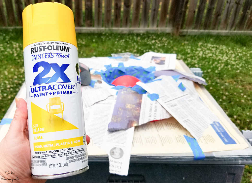 repurposing a plastic platter into fence decorations