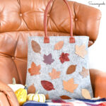 decorating a wool tote with leather leaves