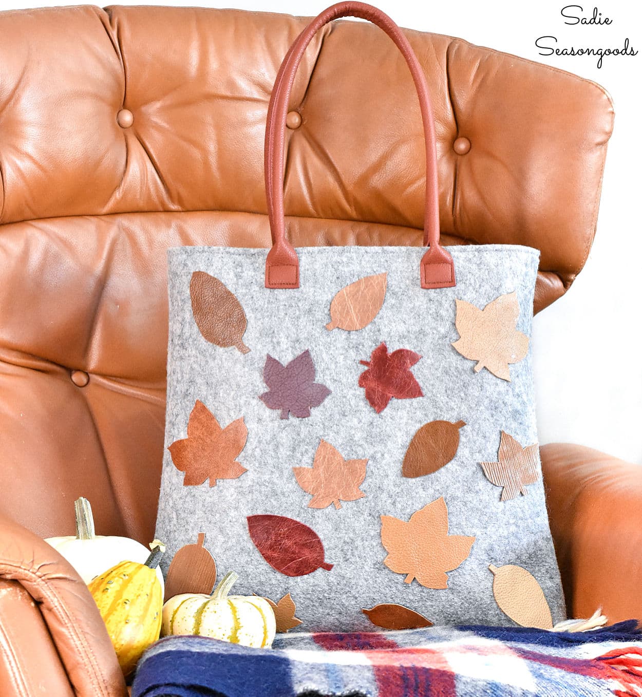 decorating a wool tote with leather leaves