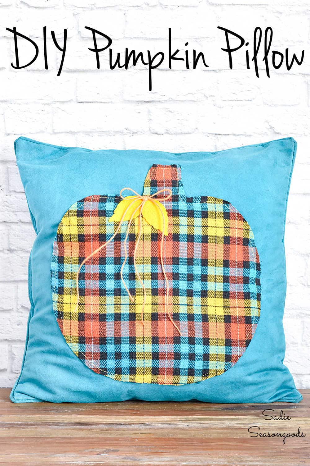 pumpkin pillow as blue and orange fall decor